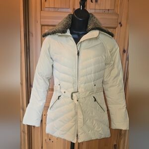 UGG Women's Light Beige Puffer Jacket, can be worn in multiple configurations.